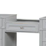 Kensington 23 inch bridge drawer in Metal Gray, shown between two vanities