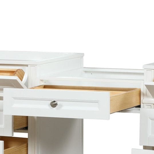 Kensington 23 inch bridge drawer in Bright White, shown between two vanities
